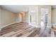 Spacious living area featuring modern flooring and seamless transitions to other rooms at 2301 Maverick St, Las Vegas, NV 89108
