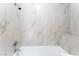 Shower features white subway tiles and sleek, chrome fixtures at 2301 Maverick St, Las Vegas, NV 89108