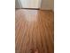 The bedroom offers ample natural light and wood-look flooring at 2604 Webster St, North Las Vegas, NV 89030