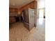 The kitchen is equipped with wood cabinets and stainless steel appliances at 2604 Webster St, North Las Vegas, NV 89030