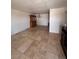 The living room showcases an ornate chandelier and tile flooring at 2604 Webster St, North Las Vegas, NV 89030