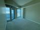 Bright bedroom with balcony and large windows overlooking city skyline at 2700 Las Vegas Blvd # 2811, Las Vegas, NV 89109