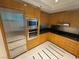Modern kitchen with stainless steel appliances, granite countertops, and stylish tiled floors at 2700 Las Vegas Blvd # 2811, Las Vegas, NV 89109