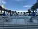 Resort-style pool area with palm trees, lounge chairs, and cascading water features at 2700 Las Vegas Blvd # 2811, Las Vegas, NV 89109