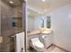 Modern bathroom featuring sleek fixtures, a glass-enclosed shower, and contemporary design elements at 2877 Paradise Rd # 906, Las Vegas, NV 89109
