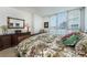 Comfortable bedroom with large windows, stylish furnishings, and a serene atmosphere, perfect for relaxation at 2877 Paradise Rd # 906, Las Vegas, NV 89109