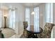 Charming breakfast nook featuring a small table and floral chairs bathed in natural light at 2877 Paradise Rd # 906, Las Vegas, NV 89109
