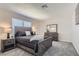 Bright bedroom with new carpet and a rustic wood furniture set, offering a blend of comfort and style at 3047 Van Buskirk Cir, Las Vegas, NV 89121