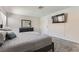 Bright bedroom featuring new carpet, dresser, and a wall-mounted television at 3047 Van Buskirk Cir, Las Vegas, NV 89121