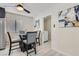 Cozy dining area with a stylish table, comfortable seating, and contemporary decor, perfect for Gathering meals at 3047 Van Buskirk Cir, Las Vegas, NV 89121