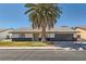 Classic home featuring a mature palm tree in the front yard and an attached two-car garage at 3047 Van Buskirk Cir, Las Vegas, NV 89121