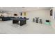 This game room has a pool table, bar stools and art at 3047 Van Buskirk Cir, Las Vegas, NV 89121