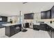 Stylish kitchen featuring a central island, modern appliances, and plenty of counter space for meal preparation and entertaining at 3047 Van Buskirk Cir, Las Vegas, NV 89121