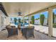 Comfortable patio seating area that overlooks a refreshing pool, ideal for enjoying sunny days at 3047 Van Buskirk Cir, Las Vegas, NV 89121