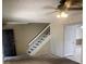 Cozy living room with stairs to the second floor at 3278 Liahona Way, Las Vegas, NV 89121