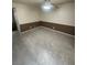 Living room with tiled flooring, two-tone walls, and lighted ceiling fan at 3278 Liahona Way, Las Vegas, NV 89121