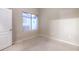 Bedroom with neutral carpet and walls, and a window with blinds at 3351 Indian Shadow St # 204, Las Vegas, NV 89129