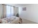 Bright bedroom featuring a comfortable bed, neutral walls, and natural light; a peaceful retreat at 3930 University Center Dr # 706, Las Vegas, NV 89119