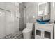 Updated bathroom featuring a sleek glass shower, stylish vanity, and modern fixtures at 4301 San Joaquin Ave, Las Vegas, NV 89102