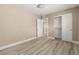 Bedroom showcasing new flooring and fresh paint, with convenient closet space at 4301 San Joaquin Ave, Las Vegas, NV 89102