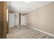 Spacious bedroom with a closet, neutral paint, and laminate flooring for modern appeal at 4301 San Joaquin Ave, Las Vegas, NV 89102