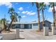 Charming single-story home with desert landscaping, mature palm trees and a long driveway at 4301 San Joaquin Ave, Las Vegas, NV 89102