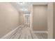 Hallway showcasing recent updates of flooring and paint leading to other rooms at 4301 San Joaquin Ave, Las Vegas, NV 89102