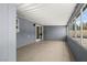 Tiled sunroom with sliding glass doors and multiple windows, offering seamless outdoor living at 4301 San Joaquin Ave, Las Vegas, NV 89102
