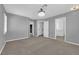 Spacious bedroom with soft carpet and neutral walls, leads to a closet and bathroom at 4604 Barnes Ct, Las Vegas, NV 89147