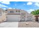 Charming two-story home with a well-kept front yard and attached two-car garage at 4604 Barnes Ct, Las Vegas, NV 89147