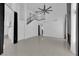 Bright living room with high ceilings, fireplace, and an open staircase to the upper level at 4604 Barnes Ct, Las Vegas, NV 89147