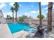 Enjoy a backyard oasis with a pool, spa, shade trees and desert landscaping for easy maintenance at 4604 Barnes Ct, Las Vegas, NV 89147