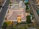 Aerial view of a modern home with a landscaped backyard, patio, and private pool at 4702 Amazing View St, Las Vegas, NV 89129