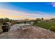 A cozy backyard dining area with a grill, ideal for outdoor entertaining and Gathering gatherings at 4702 Amazing View St, Las Vegas, NV 89129