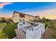 Beautiful backyard showcases a modern fire pit and plush seating arrangement at 4702 Amazing View St, Las Vegas, NV 89129