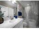 Bright bathroom featuring a tub with shower, white cabinets, and a modern sink and fixtures at 4702 Amazing View St, Las Vegas, NV 89129