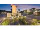A grand entrance to the community featuring stone walls and meticulously maintained desert landscaping at 4702 Amazing View St, Las Vegas, NV 89129