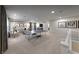 A game room boasts a ping pong table, comfortable seating, and stylish decor, perfect for entertaining at 4702 Amazing View St, Las Vegas, NV 89129