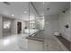 Modern main bathroom with a soaking tub, separate glass shower, and elegant finishes creates a luxurious and relaxing retreat at 4702 Amazing View St, Las Vegas, NV 89129