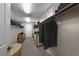 Large walk-in closet with custom organization, garment racks, shelves and a sitting area at 4702 Amazing View St, Las Vegas, NV 89129