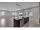 Open kitchen featuring a dishwasher, stainless steel sink, and slider door access to the backyard at 4829 E Beacon Ridge Dr, Pahrump, NV 89061