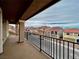 An elevated home balcony overlooking a quiet neighborhood street at 5699 Woodchester Ave, Las Vegas, NV 89139