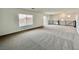 A spacious bonus room with modern railing and natural lighting at 5699 Woodchester Ave, Las Vegas, NV 89139