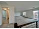 Bright, open loft space with stairway access, outdoor balcony and entry door at 5699 Woodchester Ave, Las Vegas, NV 89139