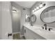 Bright bathroom featuring double sinks, modern fixtures, and neutral colors at 6008 Pebble Beach Blvd, Las Vegas, NV 89108