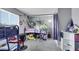 bedroom featuring bunk beds, neutral walls, window providing natural light, and playful decor at 6008 Pebble Beach Blvd, Las Vegas, NV 89108