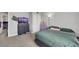 Neutral bedroom featuring a cozy bed and dark gray carpet at 6008 Pebble Beach Blvd, Las Vegas, NV 89108