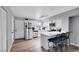 Kitchen featuring stainless steel appliances, light countertops, and a breakfast bar with seating at 6008 Pebble Beach Blvd, Las Vegas, NV 89108