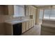 Traditional kitchen featuring neutral cabinets and tile countertops with a stainless steel sink at 6113 Desert Haven Rd, Las Vegas, NV 89130