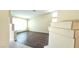 Spacious living room with hardwood floors, vaulted ceilings, and bright natural light at 6113 Desert Haven Rd, Las Vegas, NV 89130